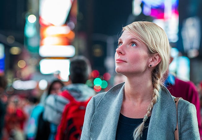 Woman looking up in wonder